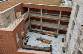 Paved courtyard terrace between the apartment blocks at Purelake Sevenoaks