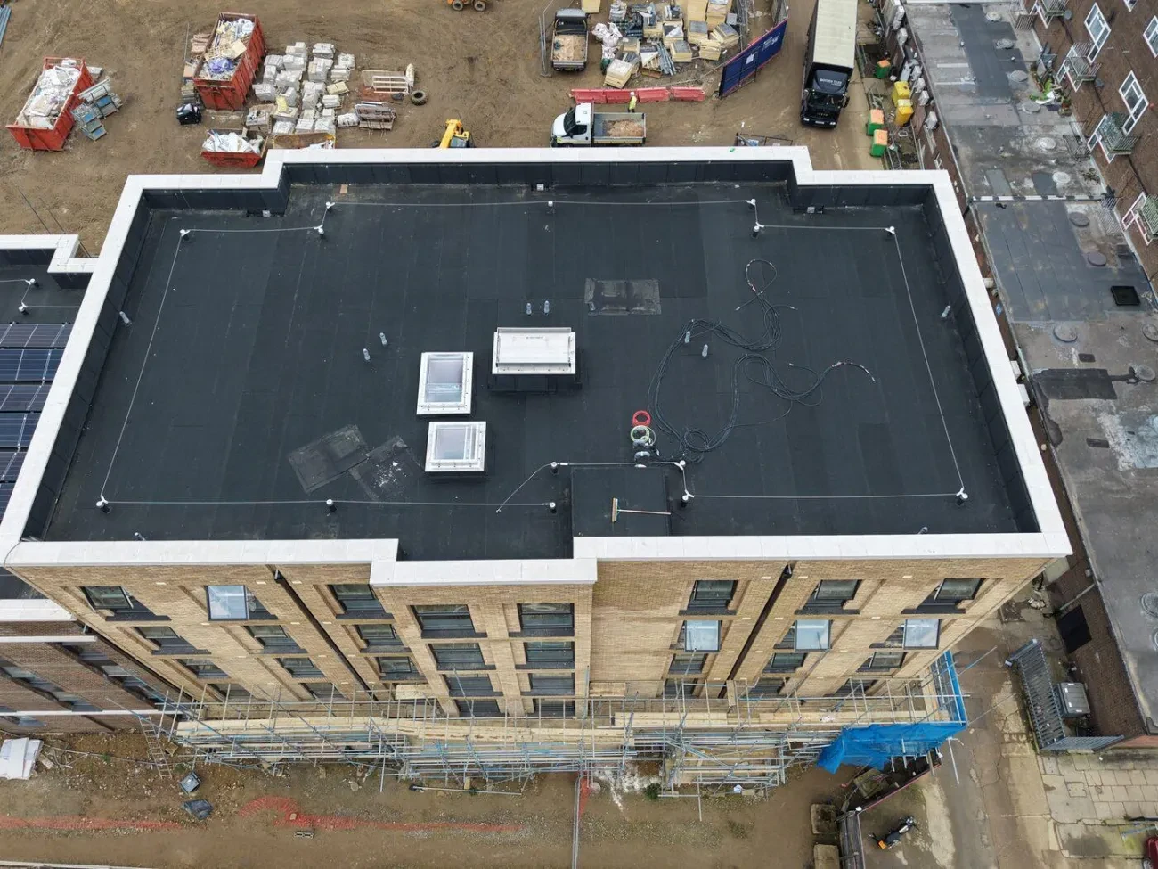 Roof level detail – rooflights, cable management and completed MOY membrane surface.