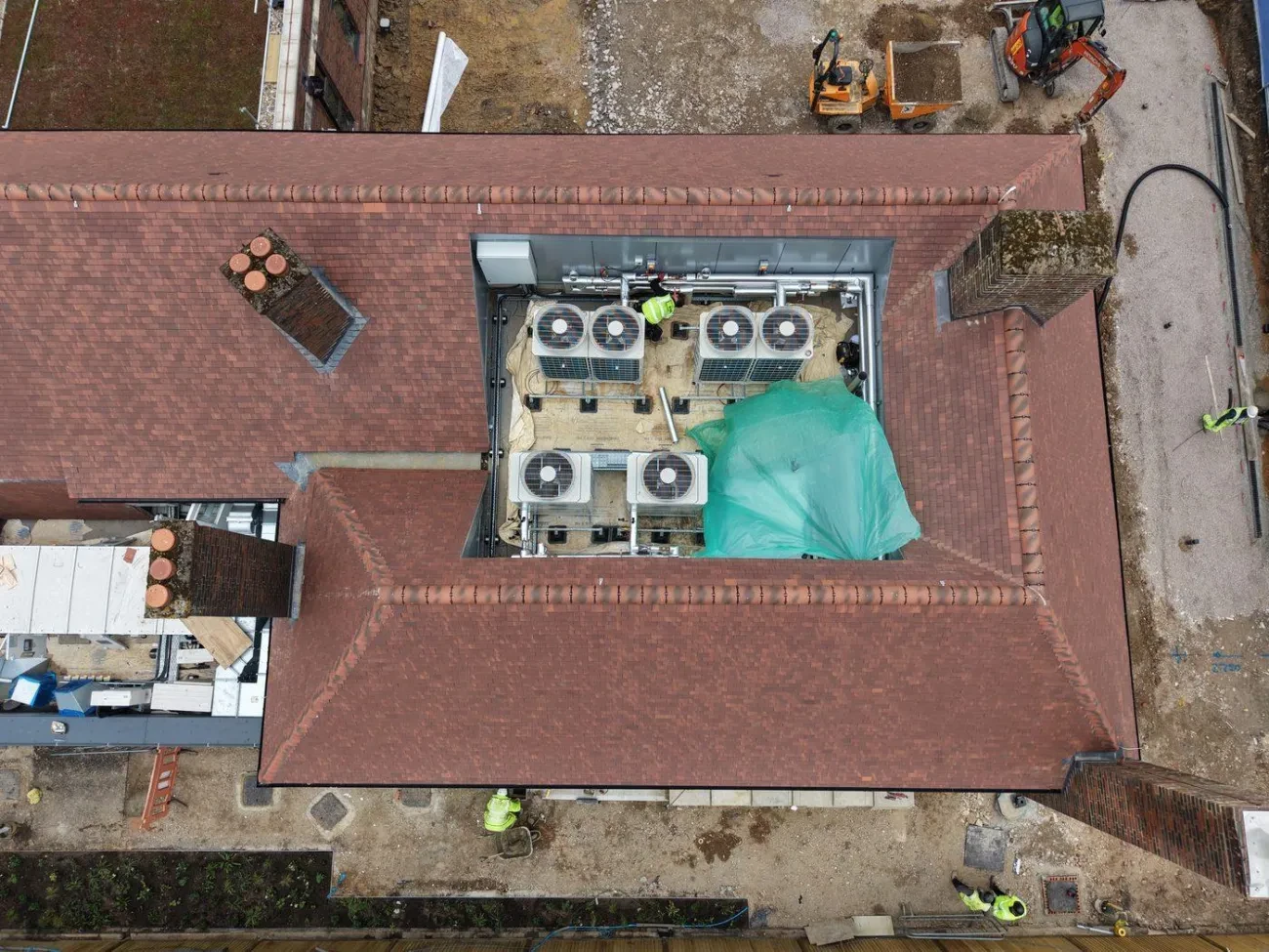 Aerial looking down into the internal plant room courtyard surrounded by the hipped Marley Plain Tile roof.